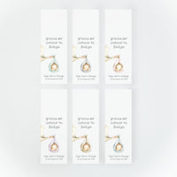 Bengalas estrella con tarjeta de la colección Cigüeña en diferentes tonos para bautizo