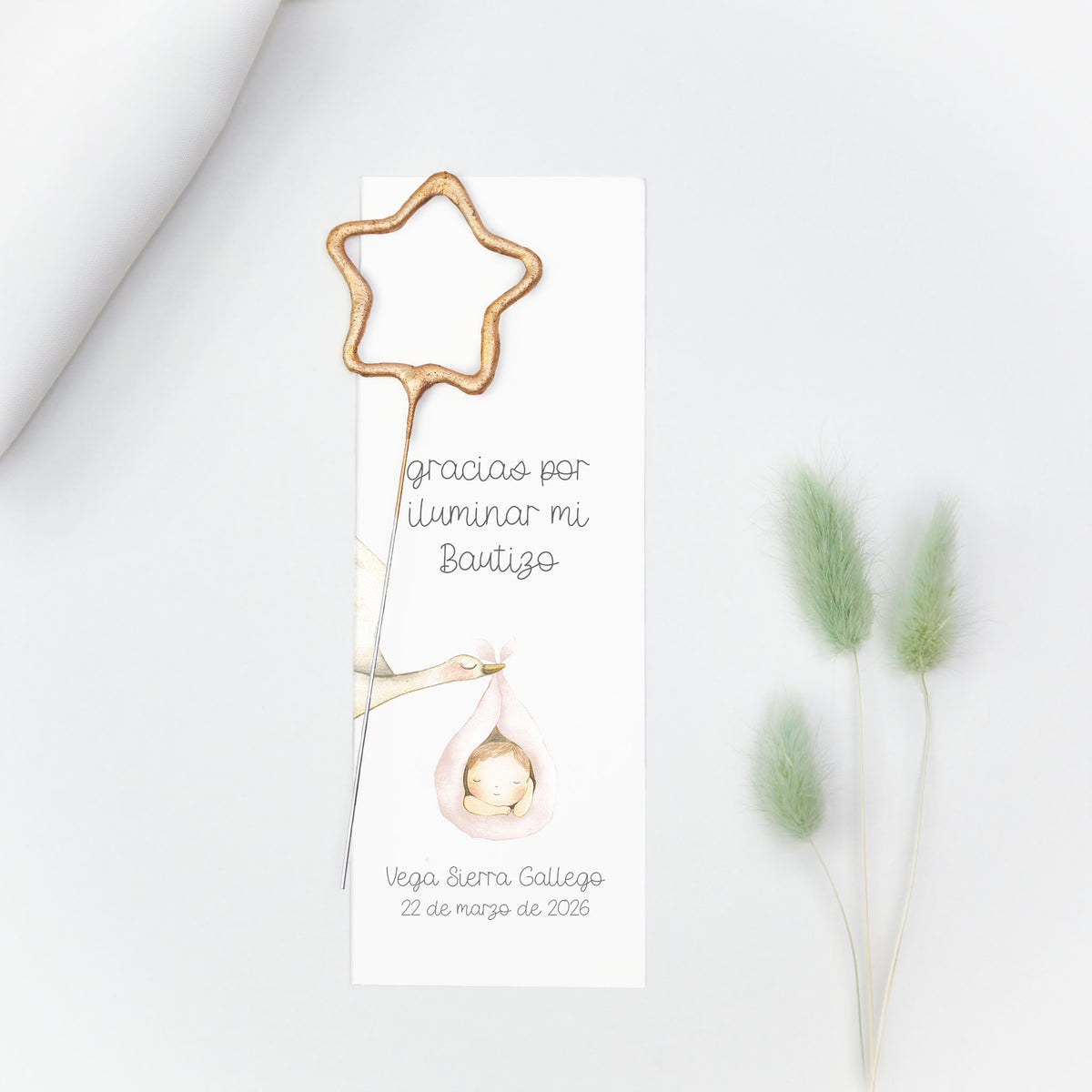 Bengala en forma de estrella con tarjeta personalizada de la colección Cigüeña para bautizo