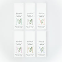 Bengalas estrella con tarjeta de la colección Inicial con diseño de hojas de olivo y varios colores para comunión