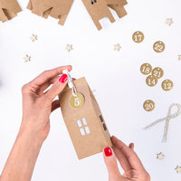 Set DIY de calendario de Adviento Casas con papeles de seda dorados