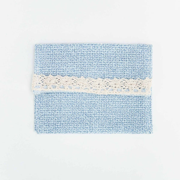 Cartera de yute en color azul. 