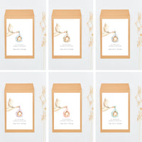 opciones de color de la bolsa de la pulsera corazón para invitados de bautizo de la colección Cigüeña