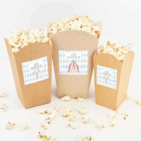 Cubo de palomitas y chuches personalizado temática circo con carpa roja y estampado de rombos azules para mesa dulce
