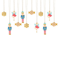 Detalle del set de 12 etiquetas de regalo navideñas: Cascanueces, bailarina, copo de nieve y caramelo
