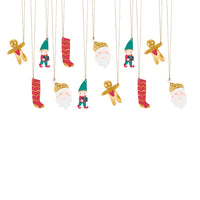 Detalle del Set de 12 etiquetas de regalo navideñas: hombre de jengibre, elfo, calcetín y Papá Noel