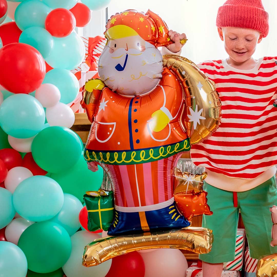 Globo foil Papá Noel de pie con saco de regalos