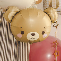 Globo foil con forma de cabeza de osito en dorado tostado con guiño y mejillas sonrosadas 56x40 cm