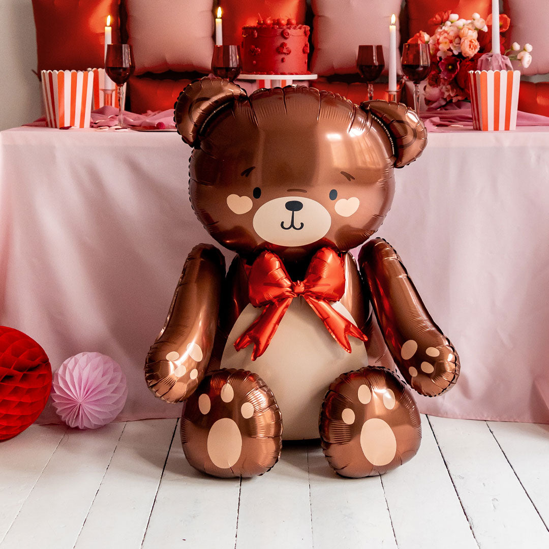 Globo foil XL oso teddy de pie en cobre metalizado con lazo rojo 75x84 cm