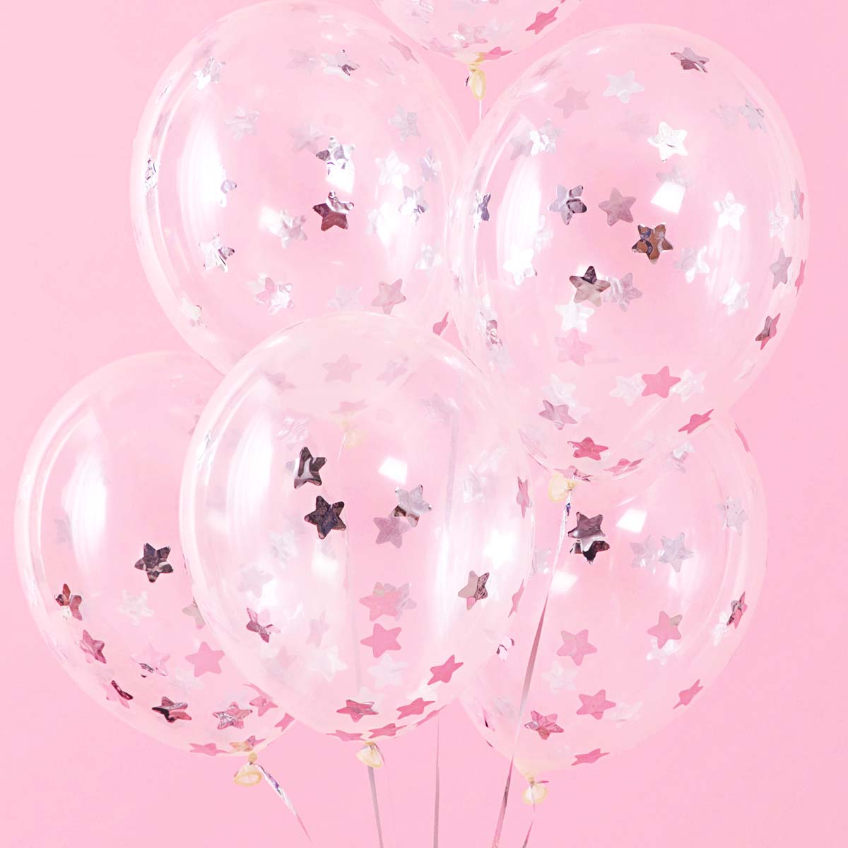 Globo transparente de 30 cm con confeti metálico plateado en forma de estrellas. Pack de 6 unidades.