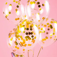 Globo transparente de 30 cm con confeti metálico dorado en forma de topos. Pack de 6 unidades.