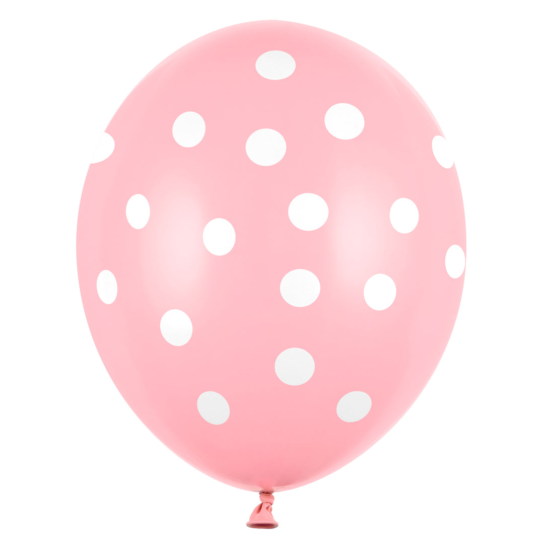 Globo de 30cm. en color rosa con topos blancos. Ideales para fiestas y celebraciones. 