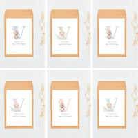 Opciones de diseño, de la colección inicial, para los sobres de las tarjetas con corazón para invitados de bautizo.