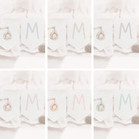 Opciones de diseño para la guirnalda personalizada de bautizo de la colección cigüeña. 