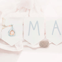 Guirnalda personalizada para bautizo de la colección cigüeña. 