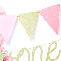 Guirnalda para fiestas y celebraciones y tonos rosa y dorado. 