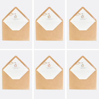 opciones de color para el sobre personalizado de la invitación para bautizo de la colección cigüeña