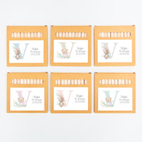 opciones de la caja de lápices de colores como detalles para niños de bautizo de la colección inicial. 