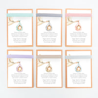 opciones de color de la libreta con bolígrafo como detalle para invitados de bautizo de la colección Cigüeña