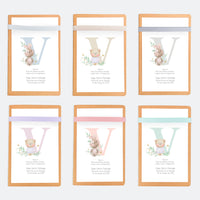 opciones de color de la libreta con lápiz para invitados de bautizo de la colección inicial. 