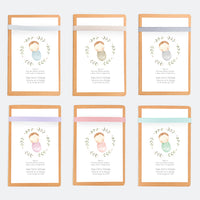 opciones de color de la libreta con lápiz para invitados de bautizo de la colección rosquito bebé. 