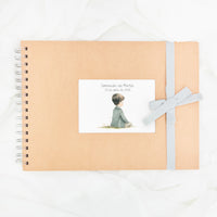 Libro de firmas para comunión con lazo en color azul.