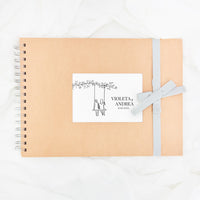 Libro de firmas personalizado para boda con lazo en color azul. 