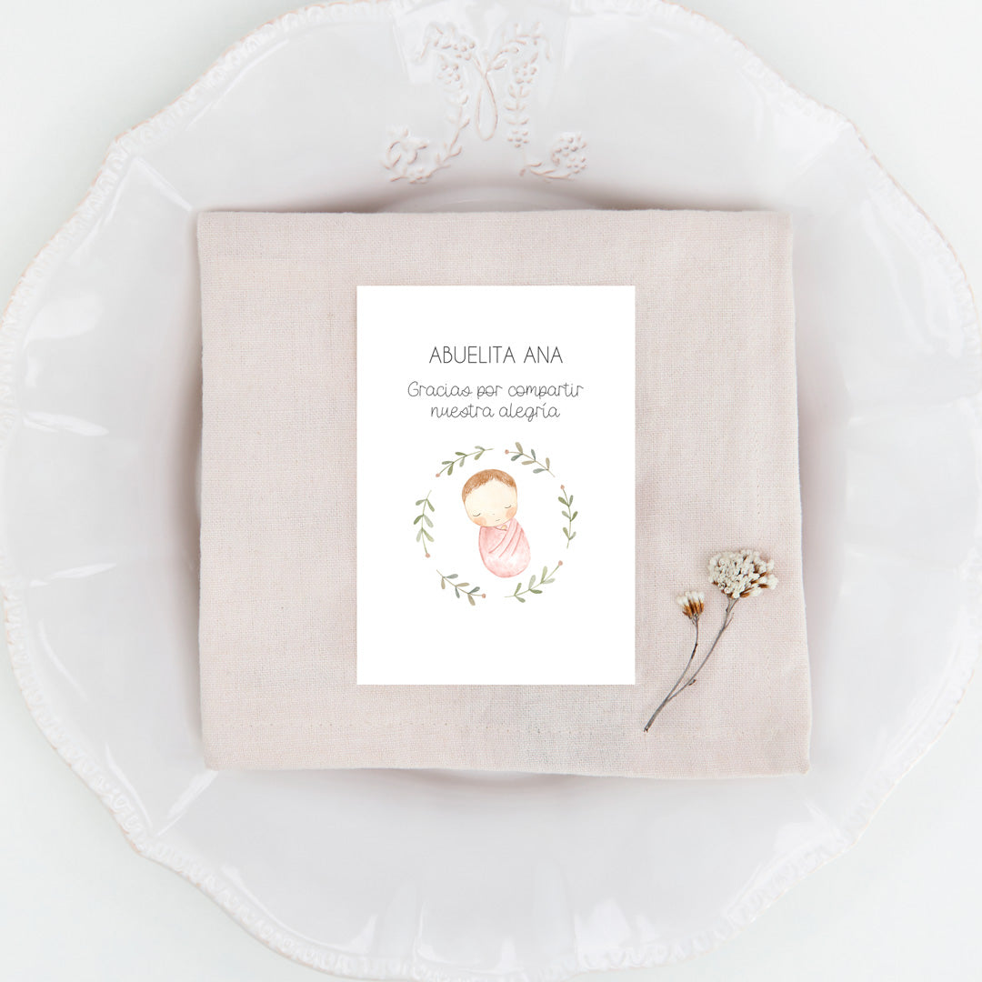 Marcasitios personalizados de la Colección Rosquito Bebé Bautizo, con ilustración del bebé arropado en un rosco de ramas.