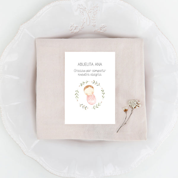 Marcasitios personalizados de la Colección Rosquito Bebé Bautizo, con ilustración del bebé arropado en un rosco de ramas.