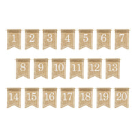 Detalle de número de mesa en yute natural con impresión blanca, decoración boho para eventos.