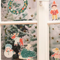 Set de pegatinas de ventana navideñas con reno, elfo, muñeco de nieve y corona ilustrados