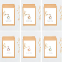 Opciones de diseño para las bolsas con tarjeta y peladillas de la colección cigüeña para bautizo. 