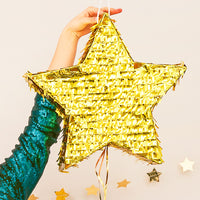 Piñata estrella dorada para cumpleaños infantil