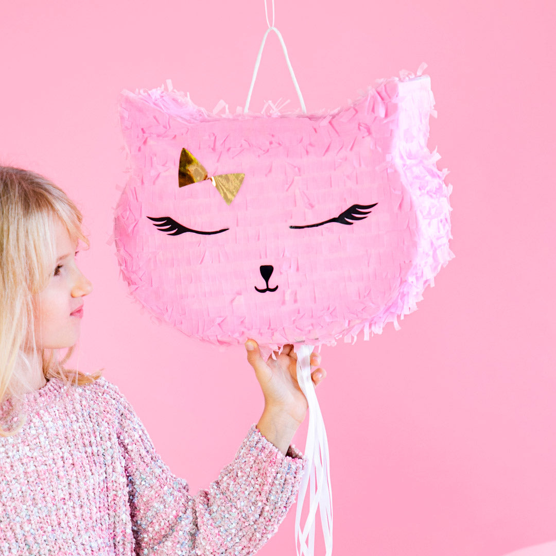Piñata infantil con forma de gato rosa para rellenar con chuches