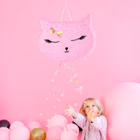 Decoración de cumpleaños con piñata de gatito rosa