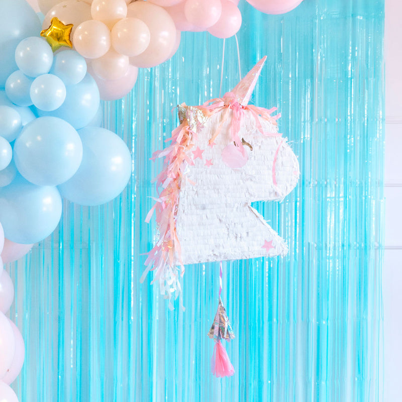 Piñata unicornio multicolor para cumpleaños infantil