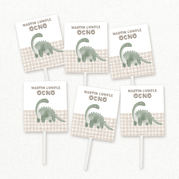 Pack de 12 piruletas personalizadas temática dinosaurio con envoltorio de estampado vichy beige para mesa dulce de cumpleaños