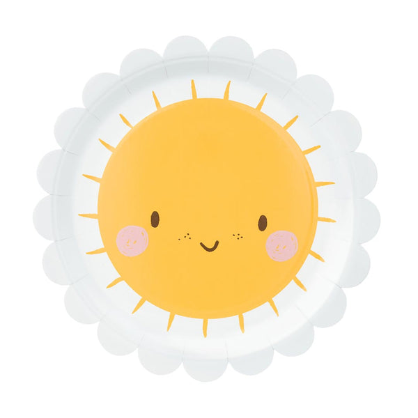 Detalle de la carita sonriente del sol con mejillas sonrosadas y rayos dorados