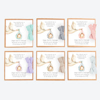 opciones para el corazón de semillas como detalle de invitados de bautizo de la colección cigüeña