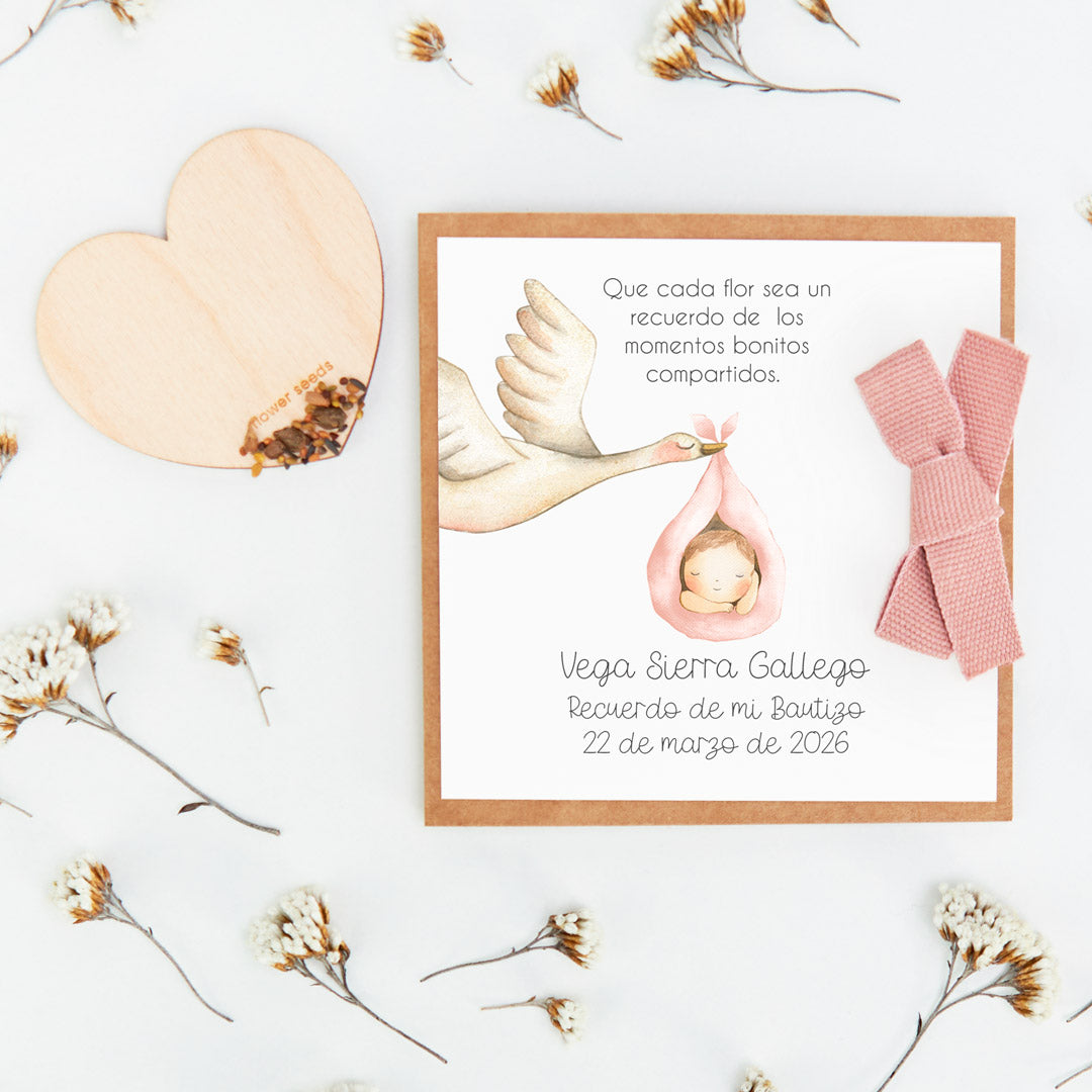 corazón de semillas como detalle de invitados de bautizo de la colección cigüeña