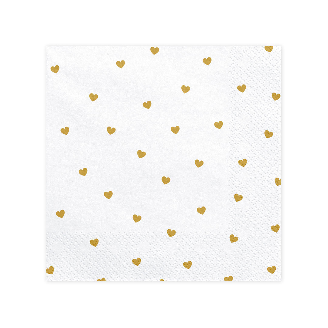 Detalle del estampado de corazones dorados en las servilletas de papel blancas. Pack de 20 unidades (33 × 33 cm).