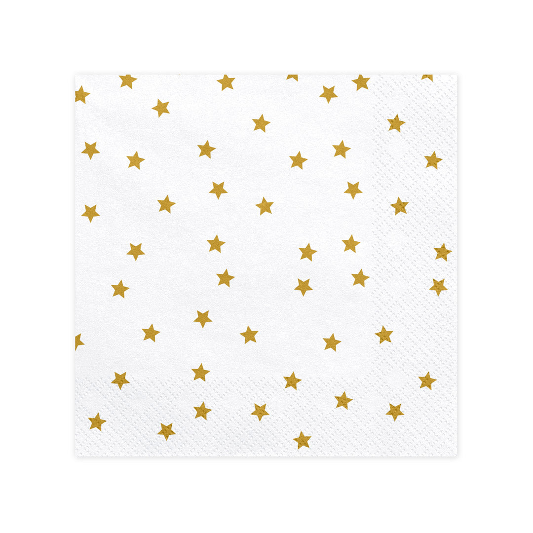 Detalle del estampado de estrellas doradas en las servilletas blancas de papel. Pack de 20 unidades (33 × 33 cm).