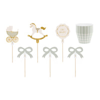 Detalle de los toppers Oh Baby cochecito caballito lacitos y disco dorado para muffins