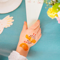 tatuajes temporales de animales de granja con flores y mariposas