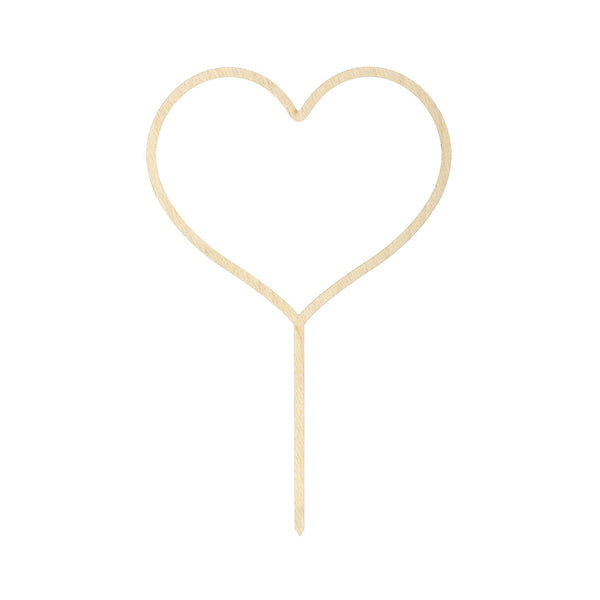 Detalle de la silueta minimalista del topper de tarta de madera corazón calado