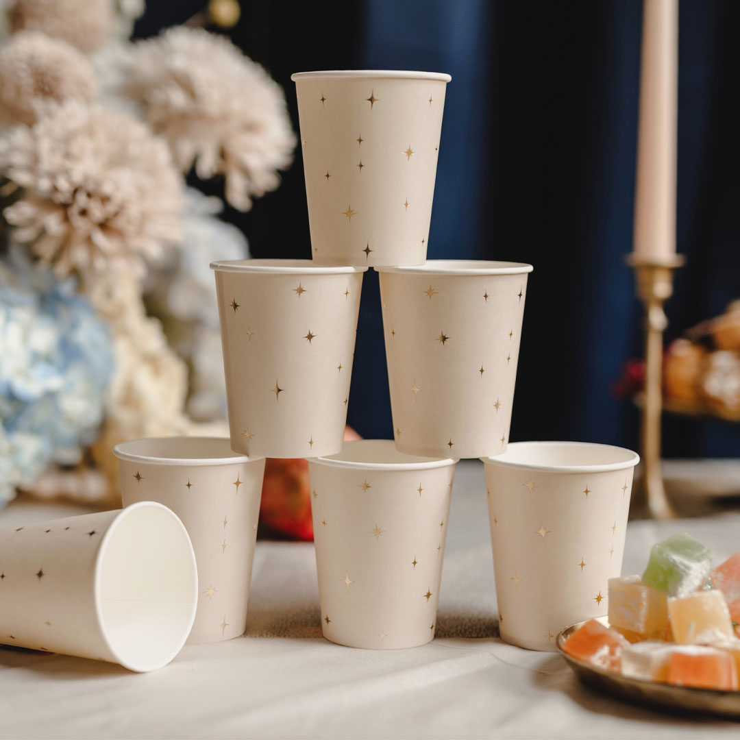 Pack 6 vasos de papel beige con estrellas doradas de cuatro puntas 220 ml