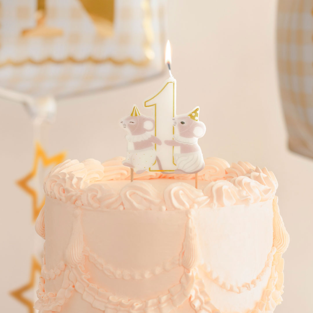 Vela de cumpleaños número 1 ratoncitos decorando tarta de primer cumpleaños