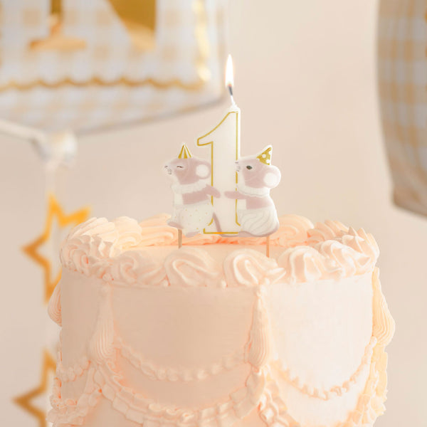Vela de cumpleaños número 1 ratoncitos decorando tarta de primer cumpleaños