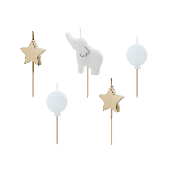 Detalle de los tres diseños de velas elefante estrella dorada y globo blanco