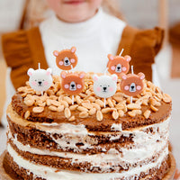 velas de cumpleaños con forma de ositos en colores pastel